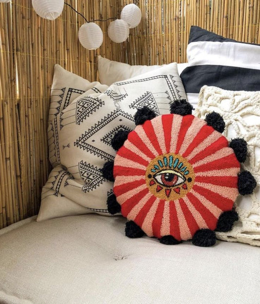 Evil eye round tufted cotton cushion cover with red radial design