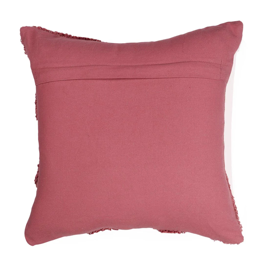 Pink pillow with frayed edges on a white background