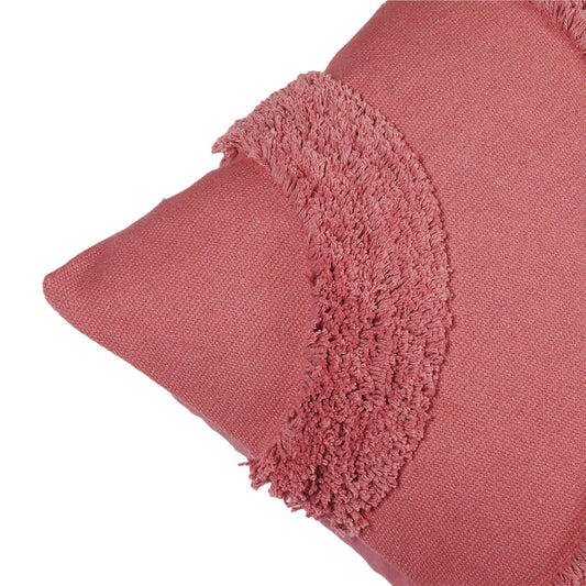 Close-up of a pink textured pillow on a white background
