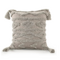 Textured pillow with tassels on a white background